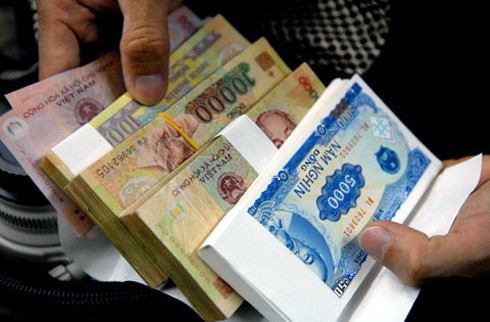 Tết này đổi tiền lẻ không đúng quy định sẽ bị xử phạt